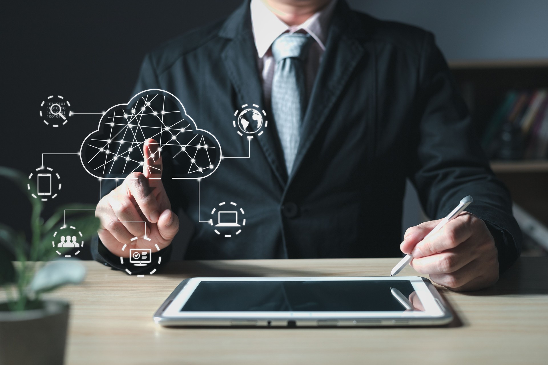 businessman touch cloud computing diagram show on hand.Data storage.the use of online digital network technology in business, buying and selling commerce online digital marketplace